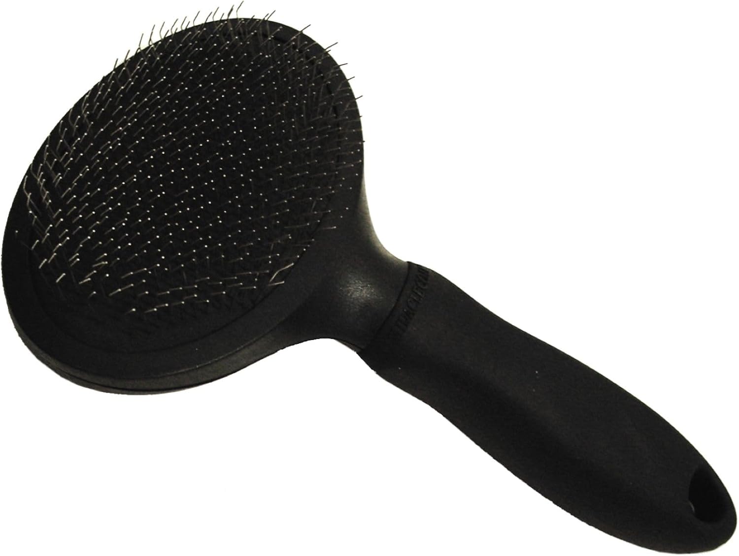 Miracle Care Slicker Brush being used on a Golden Retriever in a home grooming setting
